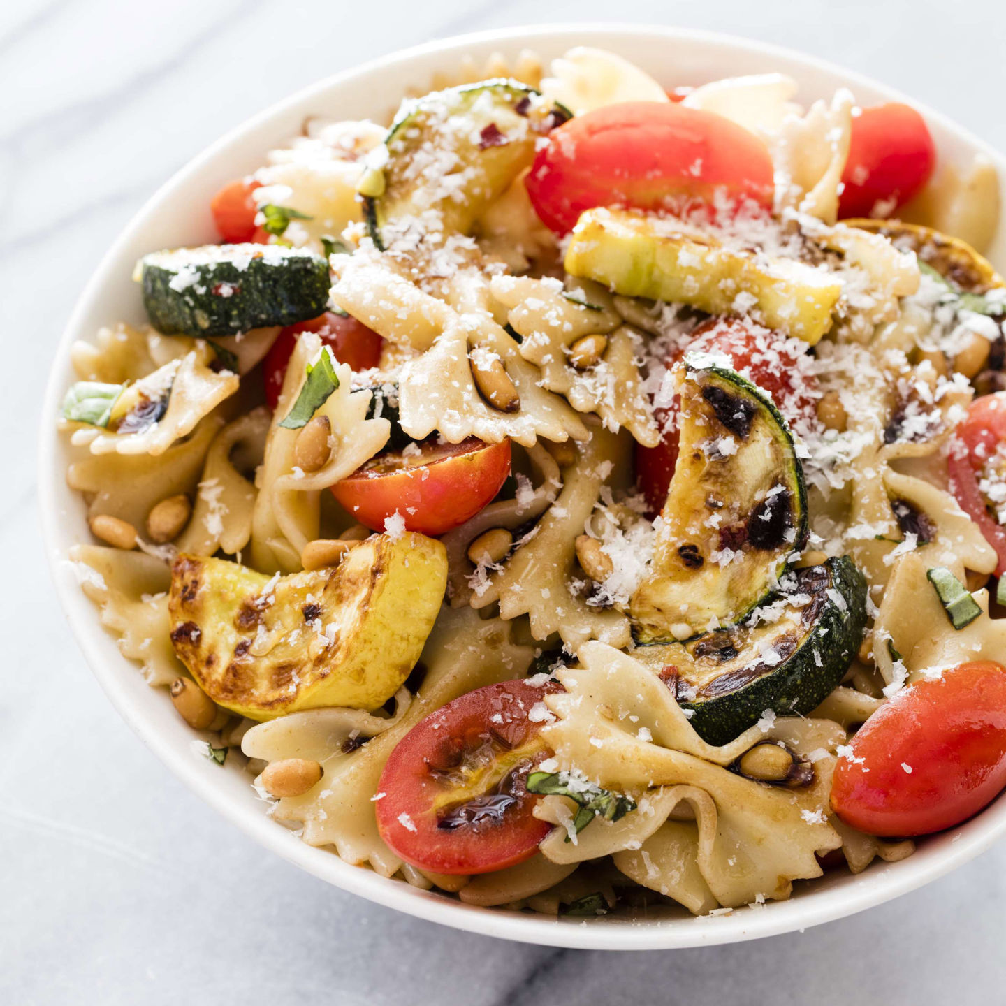 Food Column ATK Farfalle with Zucchini Tomatoes and Pine Nuts